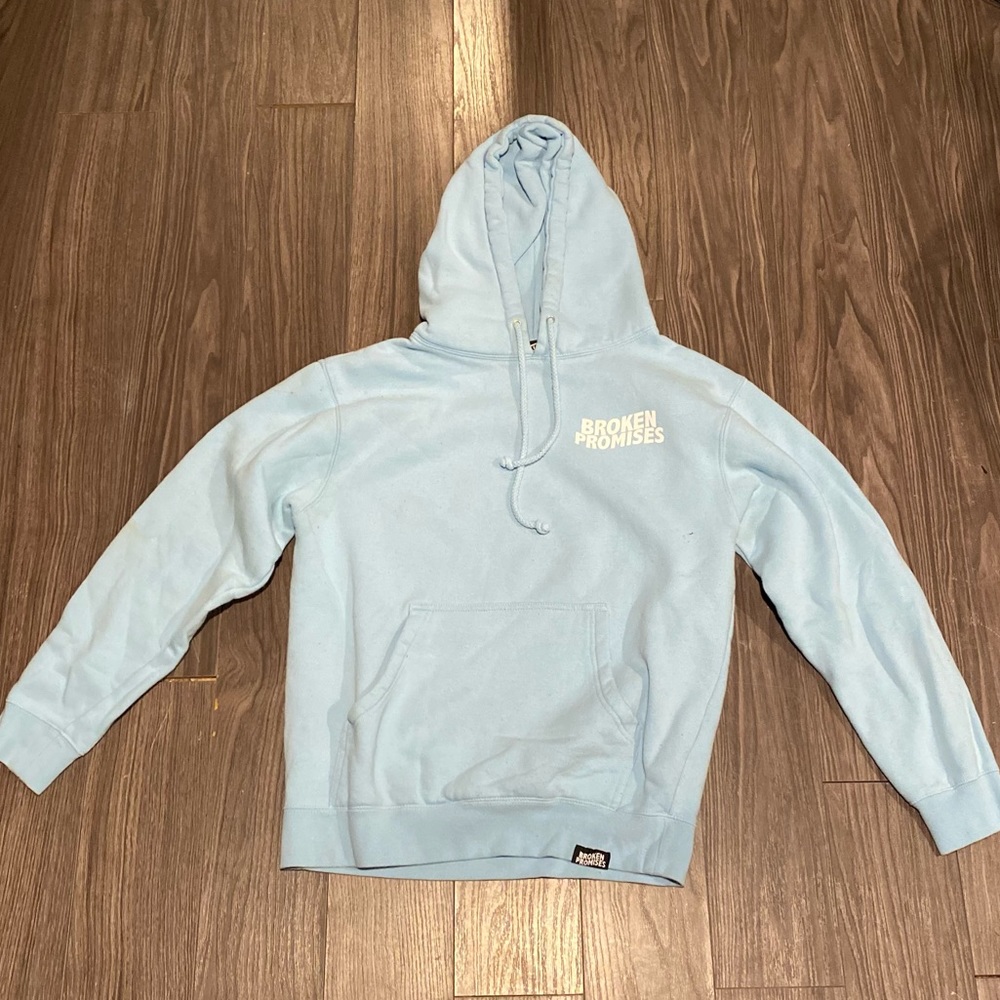 Broken promises sweater
